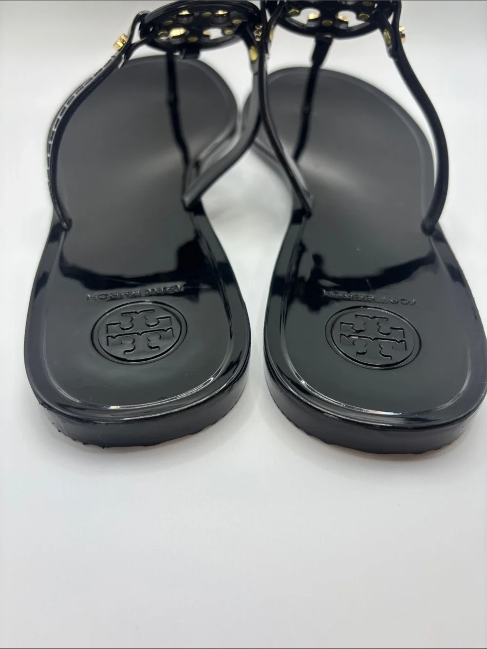 Tory Burch Black Jelly Thong Sandals with Gold Logo Medallions